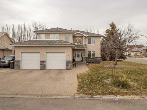 145 Canyon Close West, Lethbridge, AB - Outdoor With Facade
