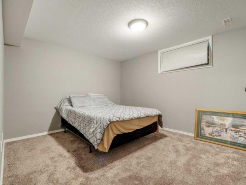 145 Canyon Close West, Lethbridge, AB - Indoor Photo Showing Bedroom