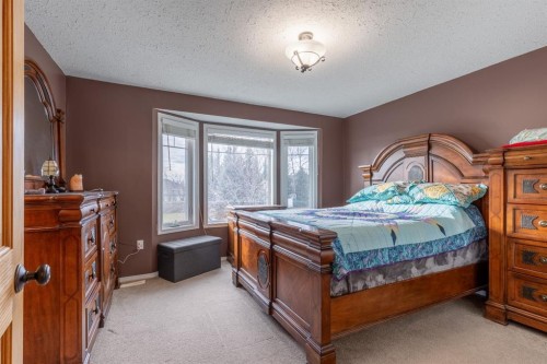 583 8 Avenue West, Cardston, AB - Indoor Photo Showing Bedroom