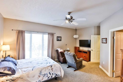 25 S 50 W, Raymond, AB - Indoor Photo Showing Bedroom