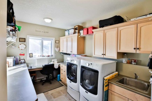 25 S 50 W, Raymond, AB - Indoor Photo Showing Laundry Room
