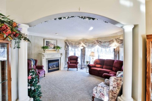 25 S 50 W, Raymond, AB - Indoor With Fireplace