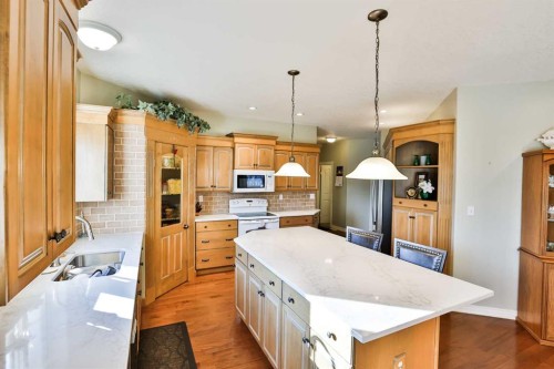 25 S 50 W, Raymond, AB - Indoor Photo Showing Kitchen With Double Sink
