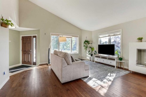 609 Sunridge Crescent West, Lethbridge, AB - Indoor Photo Showing Living Room With Fireplace