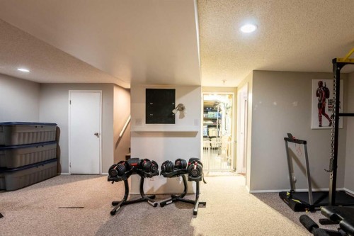 155 Ryerson Road West, Lethbridge, AB - Indoor Photo Showing Gym Room