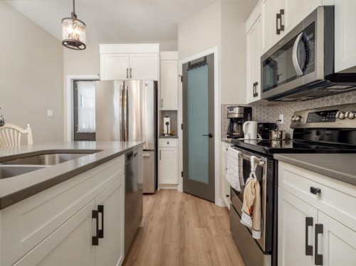842 Greywolf Run North, Lethbridge, AB - Indoor Photo Showing Kitchen With Double Sink