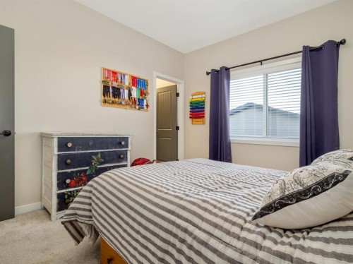 842 Greywolf Run North, Lethbridge, AB - Indoor Photo Showing Bedroom