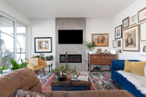 308 Grassland Boulevard West, Lethbridge, AB - Indoor Photo Showing Living Room With Fireplace