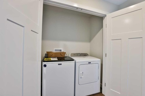 714 Fairways Drive, Vulcan, AB - Indoor Photo Showing Laundry Room