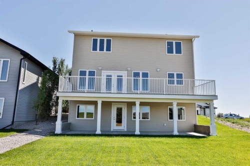714 Fairways Drive, Vulcan, AB - Outdoor With Deck Patio Veranda With Exterior