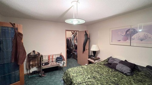 8029 Twp 102, Seven Persons, AB - Indoor Photo Showing Bedroom