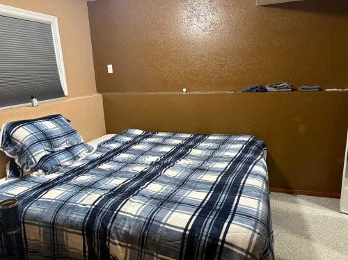 40 Cayuga Crescent West, Lethbridge, AB - Indoor Photo Showing Bedroom