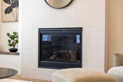 680 Devonia Road West, Lethbridge, AB - Indoor Photo Showing Living Room With Fireplace