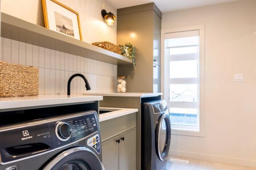 680 Devonia Road West, Lethbridge, AB - Indoor Photo Showing Laundry Room