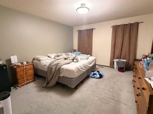 5214 38 Avenue, Taber, AB - Indoor Photo Showing Bedroom