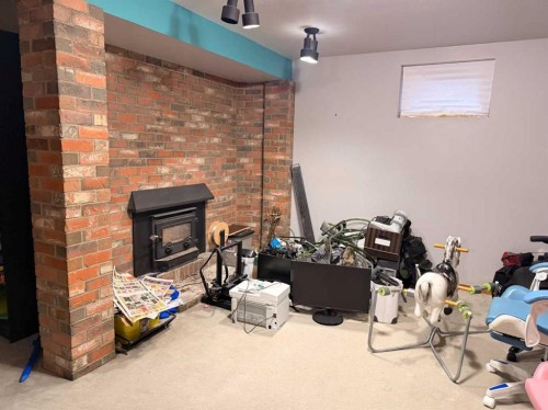 5214 38 Avenue, Taber, AB - Indoor With Fireplace