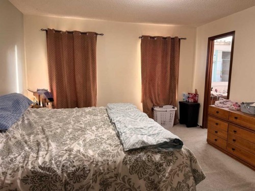 5214 38 Avenue, Taber, AB - Indoor Photo Showing Bedroom