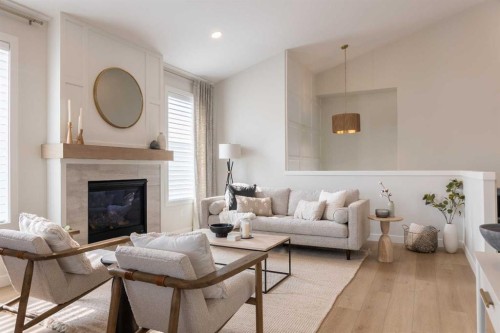 552 Riverhills Way West, Lethbridge, AB - Indoor Photo Showing Living Room With Fireplace