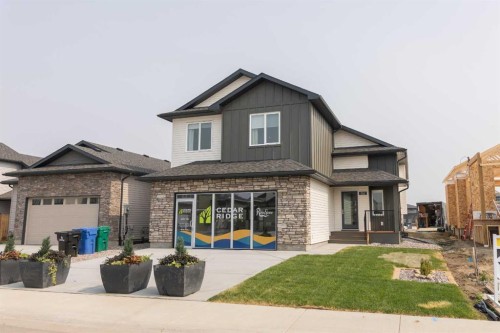 552 Riverhills Way West, Lethbridge, AB - Outdoor With Facade