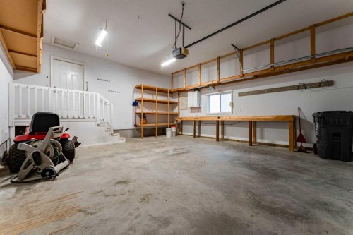 80 S 50 W, Raymond, AB - Indoor Photo Showing Garage
