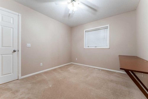 80 S 50 W, Raymond, AB - Indoor Photo Showing Other Room