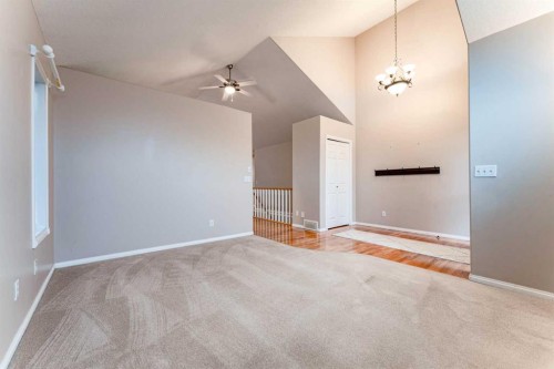 80 S 50 W, Raymond, AB - Indoor Photo Showing Other Room With Fireplace