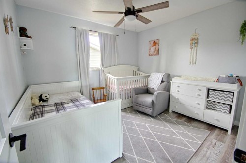 5818 53 Street, Taber, AB - Indoor Photo Showing Bedroom