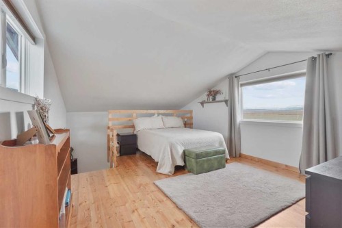 12038 Secondary Hwy 820, Rural Cardston County, AB - Indoor Photo Showing Bedroom