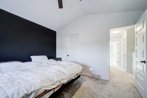 75 Blackwolf Pass North, Lethbridge, AB - Indoor Photo Showing Bedroom