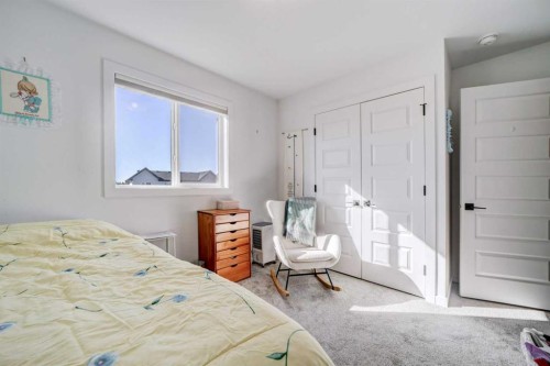 75 Blackwolf Pass North, Lethbridge, AB - Indoor Photo Showing Bedroom