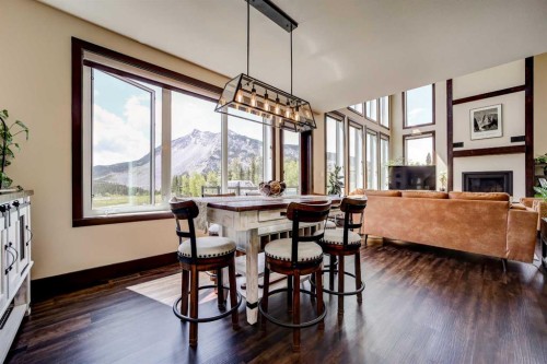 2616 Valley Ridge Drive, Frank, AB - Indoor Photo Showing Dining Room With Fireplace