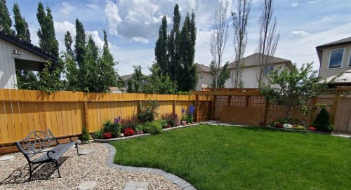 753 Twinriver Loop West, Lethbridge, AB - Outdoor With Backyard