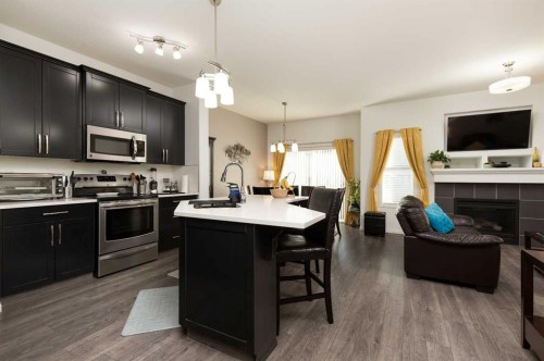 753 Twinriver Loop West, Lethbridge, AB - Indoor Photo Showing Kitchen With Double Sink With Upgraded Kitchen