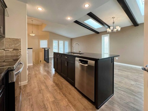 317 Moonlight Way West, Lethbridge, AB - Indoor Photo Showing Kitchen With Upgraded Kitchen