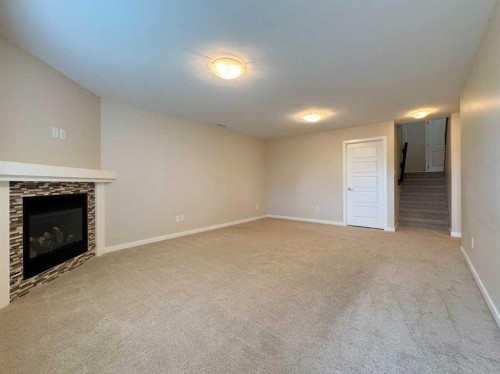 317 Moonlight Way West, Lethbridge, AB - Indoor With Fireplace