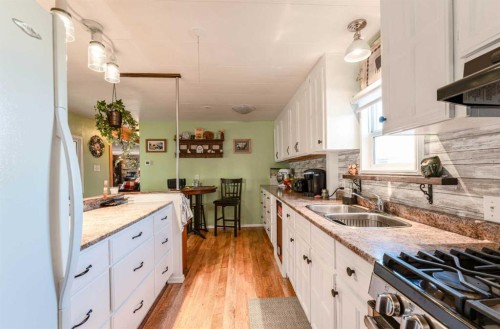104 2Nd Street, Warner, AB - Indoor Photo Showing Kitchen With Double Sink