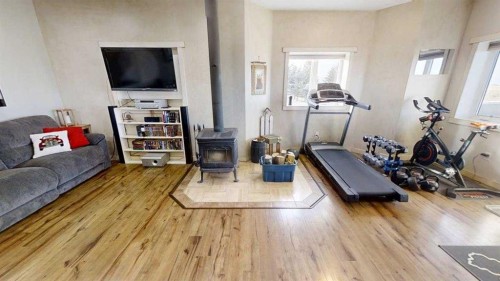 62072 Range Rd 215, Welling, AB - Indoor Photo Showing Gym Room