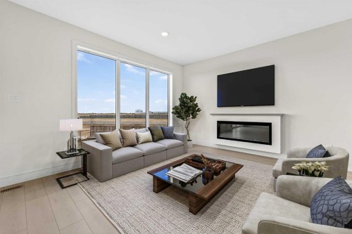 241 Blackwolf Place North, Lethbridge, AB - Indoor Photo Showing Living Room With Fireplace