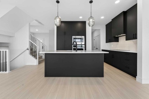 241 Blackwolf Place North, Lethbridge, AB - Indoor Photo Showing Kitchen With Upgraded Kitchen