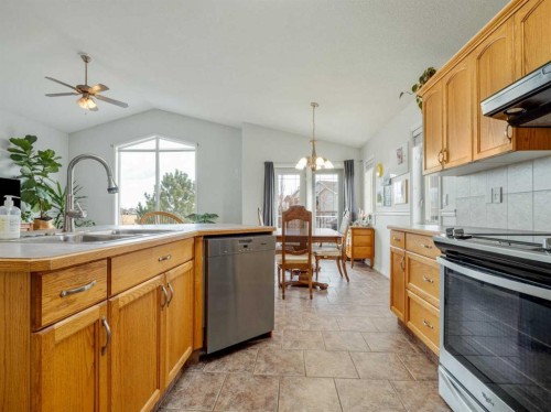 47 Kodiak Boulevard North, Lethbridge, AB - Indoor Photo Showing Kitchen With Double Sink