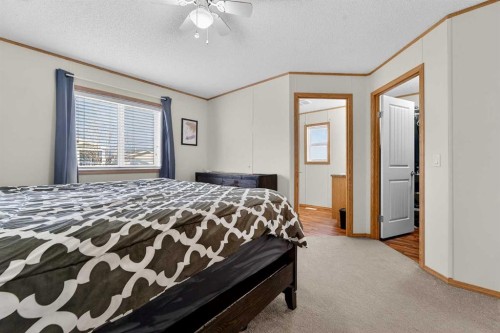 5004 Seasons Boulevard, Coaldale, AB - Indoor Photo Showing Bedroom