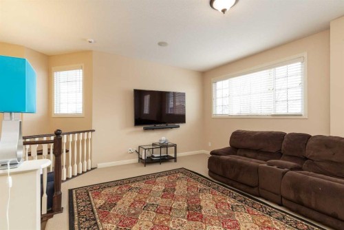 443 Everbrook Way Sw, Calgary, AB - Indoor Photo Showing Living Room