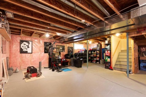 443 Everbrook Way Sw, Calgary, AB - Indoor Photo Showing Basement
