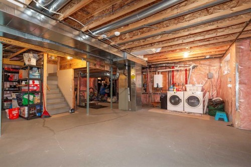 443 Everbrook Way Sw, Calgary, AB - Indoor Photo Showing Basement