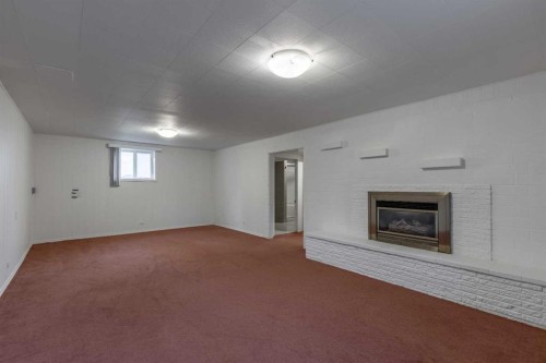 315 Dieppe Boulevard South, Lethbridge, AB - Indoor With Fireplace