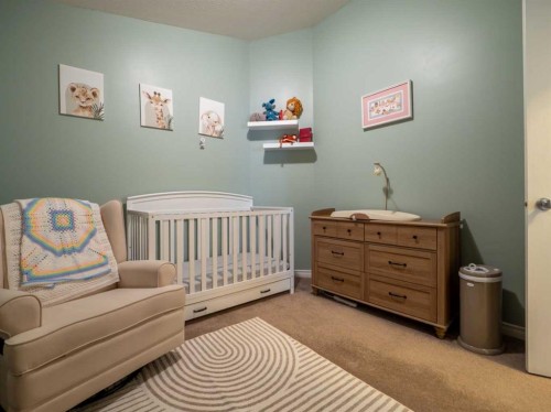 263 Mt Sunburst Way West, Lethbridge, AB - Indoor Photo Showing Bedroom