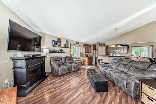 41 Canyoncrest Point West, Lethbridge, AB - Indoor Photo Showing Living Room With Fireplace
