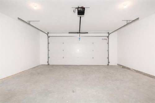 332 Rivergrove Chase West, Lethbridge, AB - Indoor Photo Showing Garage
