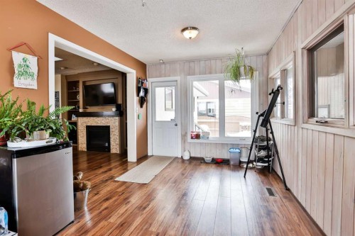 1813 Elm Road South, Lethbridge, AB - Indoor With Fireplace