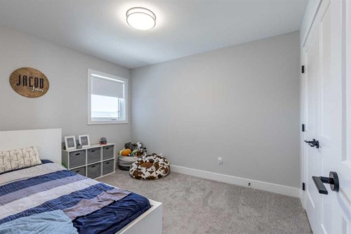 4889 7Th Street West, Claresholm, AB - Indoor Photo Showing Bedroom